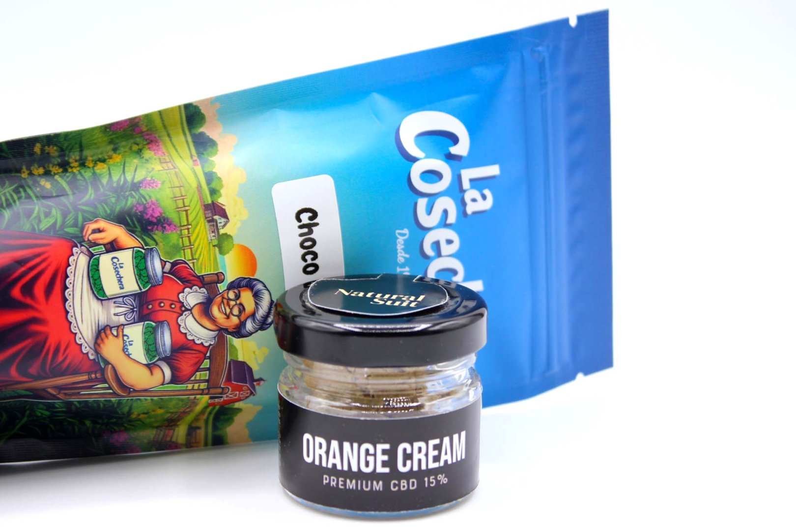 Pack de Choco Polen La Cosechera junto al frasco de Orange Cream Natural Suit